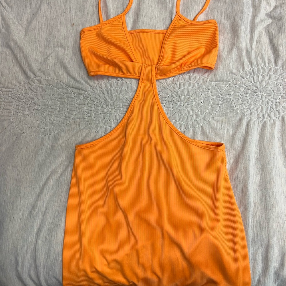 This is an orange, short cut out dress from amazon. Super cute on!